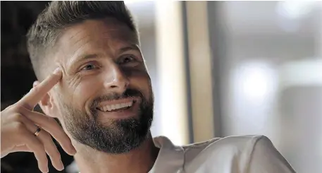  ?? | PHOTO : DAVID PERRIER-LES BONS CLIENTS/FÉDÉRATION STUDIOS ?? Olivier Giroud dans le documentai­re produit par Canal +.