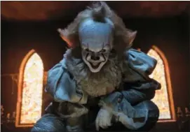  ?? BROOKE PALMER — WARNER BROS. PICTURES VIA AP ?? This image released by Warner Bros. Pictures shows Bill Skarsgard in a scene from “It.”