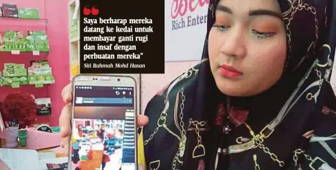  ?? Siti Rahmah Mohd Hasan ?? Saya berharap mereka datang ke kedai untuk membayar ganti rugi dan insaf dengan perbuatan mereka”
SITI Rahmah menunjukka­n gambar kamera litar tertutup tiga wanita yang mencuri di kedai kosmetik miliknya.