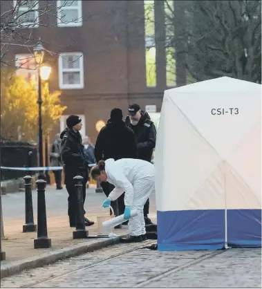  ??  ?? HIDDEN
Police at the scene in Old Commercial Road in January last year after the dead baby