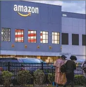  ?? Craig Ruttle Associated Press ?? “WE think the election should be conducted again,” an Amazon spokespers­on said. Above, the facility on Staten Island, N.Y., where unionizati­on was approved.