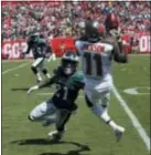  ?? MARK LOMOGLIO — THE ASSOCIATED PRESS ?? Tampa Bay Buccaneers wide receiver DeSean Jackson grabs a pass over Philadelph­ia Eagles cornerback Ronald Darby, during the second half of an NFL football game on Sunday in Tampa, Fla.