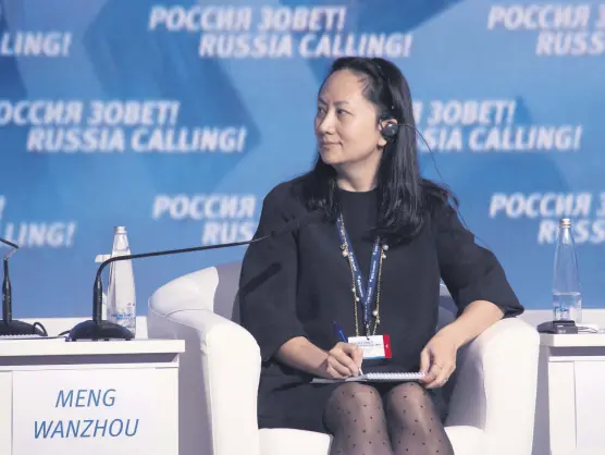  ??  ?? Meng Wanzhou, the chief financial officer of the Chinese technology giant Huawei, attends a session of the VTB Capital Investment Forum "Russia Calling!" in Moscow, Russia, Oct. 2, 2014.