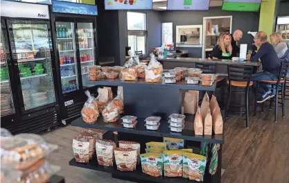  ?? PHOTOS BY COREY PERRINE/FLORIDA TIMES-UNION ?? PangeaKeto’s market offers pre-packaged meals as well as other low-carb, sugar-free and gluten-free snacks and desserts.