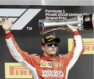  ?? Darron Cummings/ap ?? O finlandês Kimi Raikkonen comemora no pódio sua vitória no GP dos Estados Unidos; a última vitória do ferrarista de 39 anos havia sido na Austrália, em 2013