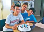 ?? COURTESY PHOTO ?? Jefferson Taborda, left, is shown with his mother, Francia Elena Benitez-Castaño, and his younger brother, Steven Taborda, during a birthday celebratio­n a few years ago at their home in Las Cruces. Jefferson Taborda and his mother, undocument­ed...