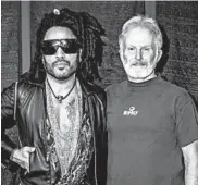  ?? MARK KELTON/AP ?? Lenny Kravitz, the headliner at this years Spookstock concert poses with Army Gen. Tony Thomas, former commander of U.S. Special Operations Command.