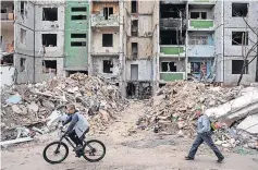  ?? ?? Horror Heavily damaged apartment block in Chernihiv