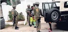  ?? FILE ?? Soldiers in operation during the state of emergency currently on in St James.