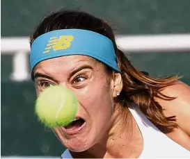  ??  ?? Sorana Cirstea of Romania returning a shot to American Nicole Gibbs in the second round of the Seoul Open yesterday. Cirstea won 6-3, 6-3. — AP Powering on: