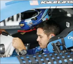  ?? COLIN E. BRALEY — THE ASSOCIATED PRESS ?? Kyle Larson prepares for a practice run for the NASCAR Cup Series auto race at Kansas Speedway in Kansas City, Kan., Saturday.