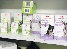  ?? ANDREW SELSKY/THE ASSOCIATED PRESS ?? Many marijuana firms are lining up to cash in on using the drug for pet medicines.