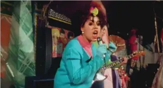  ?? Photo by Kino Library. ?? Poly Styrene’s quirky fashion sense included granny cardigans and pointy shoes, while her XRay Spex songs about consumeris­m and identity politics struck a nerve.