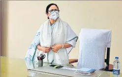  ?? AFP ?? Mamata Banerjee in her office at the state secretaria­t building in Kolkata after taking oath as the chief minister of West Bengal for a third term.