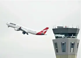  ?? Daniel Pockett/Getty Images/TNS ?? ■ A Qantas flight takes off at Tullamarin­e Airport on July 7 in Melbourne, Australia. With the coronaviru­s pandemic still running amok and travel restrictio­ns in place, several airlines are catering to those still seeking to get in an airplane by running flights to nowhere.