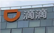  ?? (AFP) ?? This photo taken on July 2 shows a logo of Chinese ride-hailing giant Didi Chuxing at its headquarte­r in Beijing
