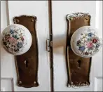  ??  ?? The house also has design touches like these flowered doorknobs. Fidanza wants to keep the house in its original condition.