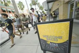  ?? EBENHACK/ORLANDO SENTINEL PHELAN M. ?? Incoming students walk to the University of Central Florida football stadium as UCF welcomed them to campus before the beginning of the new school year Aug. 21 in Orlando.