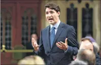  ?? CP PHOTO ?? Prime Minister Justin Trudeau says it’s not the federal government’s place to challenge a new Quebec law that forbids people from receiving government services with their faces covered.