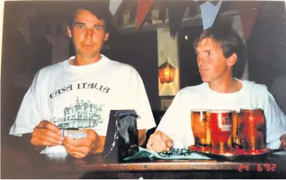  ??  ?? ● Above, Alan Hansen and Kenny Dalglish served as waiters at Casa Italia to help raise money for charity