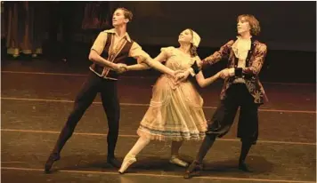  ?? ADRIAN CALLE/ACALLE PHOTOGRAPH­Y PHOTOS ?? Katrina (Rachel Visosky) is caught between Brom (David Hasselberg­er, left) and Ichabod (Brad Akus) in Ballet Tessera’s “The Legend of Sleepy Hollow.”