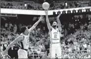  ?? AP/GERRY BROOME ?? North Carolina’s Joel Berry II (2) made the game-winning shot with 10.3 seconds left to lift No. 13 North Carolina over Wake Forest 73-69 on Saturday in Chapel Hill, N.C.