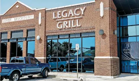  ?? CHRIS LANDSBERGE­R, THE OKLAHOMAN ARCHIVES] [PHOTO BY ?? The Bricktown space at 224 Johnny Bench Drive — the one-time KD’s Southern Kitchen and most recently Legacy Grill — is now a Charleston’s.