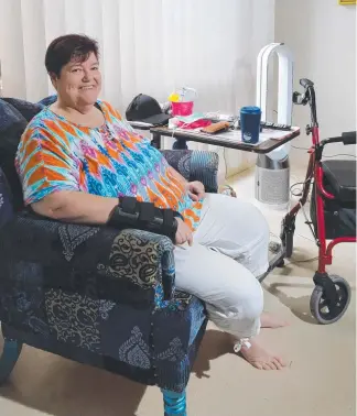  ?? Picture: GLENN HAMPSON ?? MS sufferer Thea Wren has struggled to find suitable housing on the Gold Coast for years but will soon move into special accommodat­ion at Robina.