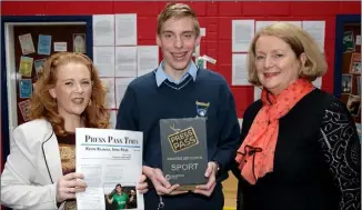  ??  ?? Winner of the Press Pass Sports Writer Award for 2017/2018 Rory Cassidy, with teacher Stephanie McKenna and Principal Fionnuala Greene.