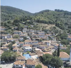  ??  ?? Şirince, a quiet hillside village, welcomes thousands of tourists every year.