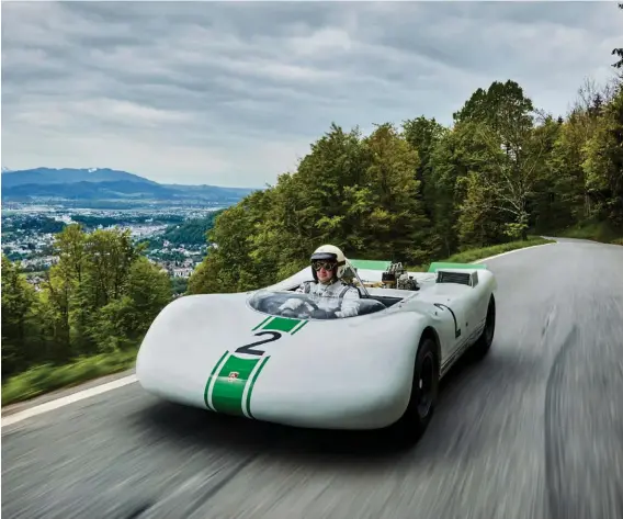  ??  ?? Above: Porsche took the Bergspyder back to Gaisberg in a re-enactment of its first competitiv­e outing back in September 1968. Photo gives you some idea of how vulnerable the driver was…