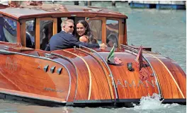  ?? — PTI ?? In a file photo, footballer Bastian Schweinste­iger and Ana Ivanovic in a boat after their wedding in Venice. Germany captain Schweinste­iger, a veteran of 120 caps, announced his internatio­nal retirement on Friday.