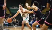  ?? JOE CRAVEN/WRIGHT STATE ATHLETICS ?? Wright State’s Andrew Welage drives past an IUPUI defender during Wednesday night’s easy win at the Nutter Center.