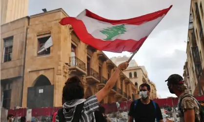  ??  ?? A protest outside the offices of Lebanon’s parliament on the day the cabinet resigned. Photograph: Maxim Grigoryev/TASS