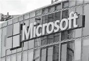  ?? [AP FILE PHOTO] ?? This 2016 photo shows the Microsoft logo in Issy-les-Moulineaux, outside Paris, France. The Internal Revenue Service is providing some relief for companies, like Microsoft, facing looming tax bills after they stockpiled cash offshore free of U.S....