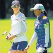  ?? AP ?? Leader Nelly Korda of USA (left) and Aditi Ashok during the third round of the women's golf in Tokyo on Friday.