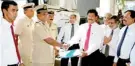  ??  ?? People’s Leasing Chairman Gamini S. Senerath officially handing over the Tipper vehicles to Civil Security Department Director General Rear Admiral Ananda Peiris in the presence of People’s Leasing Directors P. Kudabalage, Anura Chandrasir­i and...