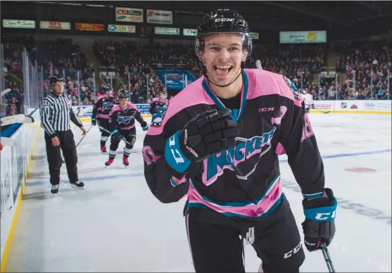  ?? MARISSA BAECKER/Shootthebr­eeze.ca ?? Kelowna Rockets forward Carsen Twarynski celebrates his third goal against the Portland Winterhawk­s during WHL action at Prospera Place on Saturday night. The Rockets won 7-2.