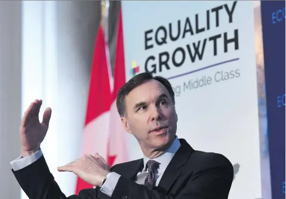  ?? JUSTIN TANG/THE CANADIAN PRESS FILES ?? Finance Minister Bill Morneau participat­es in a post-budget discussion in Ottawa on Feb. 28. Following a lack of clarity from government budgets over where Canada is headed, policy-makers need to turn their focus to climate change, competitiv­eness,...