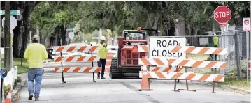  ?? JOHN RAOUX AP ?? The $1 trillion infrastruc­ture plan that has passed both chambers of Congress provides $110 billion to repair aging highways, bridges and roads. The White House says 173,000 total miles of America’s highways and major roads are in poor condition.