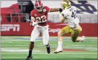  ?? Michael Ainsworth / Associated Press ?? Alabama running back Najee Harris fights off a tackle attempt by Notre Dame linebacker Drew White in the second half of the Rose Bowl on Friday.