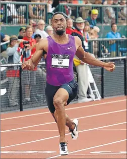  ?? FOTO: AP ?? Tyson Gay (9”87) se ganó una plaza en 100 m para el Mundial de agosto