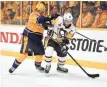  ??  ?? Penguins stars Sidney Crosby, right, and Evgeni Malkin were neutralize­d Saturday.