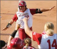  ?? AP/The Oklahoman/BRYAN TERRY ?? Oklahoma’s Jocelyn Alo celebrates after hitting a home run in the first inning of Saturday’s NCAA Women’s College World Series game against Florida in Oklahoma City. Oklahoma won 2-0.