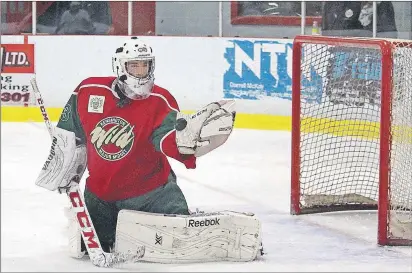  ?? MILLICENT MCKAY/TC MEDIA ?? Kensington Monaghan Farms Wild goalie Caleb Coyle makes a save during Saturday night’s home opener at the Community Gardens Complex.