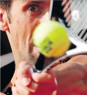  ?? THOMAS SAMSON/AFP/GETTY IMAGES ?? Serbia’s Novak Djokovic beat Spain’s Fernando Verdasco 6-3, 6-4, 6-2 during their men’s singles fourth-round match at the French Open Sunday to advance to the quarter-finals.