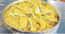  ??  ?? Cavite Republic’s Paella Valenciana with Magnolia chicken and chorizo