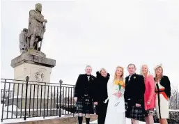  ?? 050318WEDD­ING_02 ?? Many thanks Among those honoured at the reception on Monday was Balfron-based registrar Lynn Phillips who married Hillfoots couple Cameron Watt and Angela Beardsley on the Stirling Castle Esplanade after heavy snow meant they had to switch their...