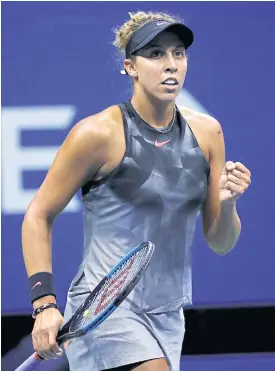  ??  ?? Madison Keys reacts to winning a point against CoCo Vandeweghe.