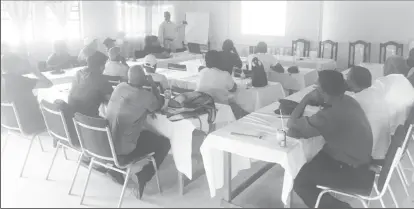  ??  ?? James Thomas, Senior Assistant Field Manager of the East Demerara Estate, conducting the training session for the ex-sugar workers yesterday at the Wales Estate Staff Club and Training Centre.